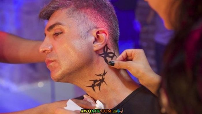 صورة وشم أوزجان دينيز