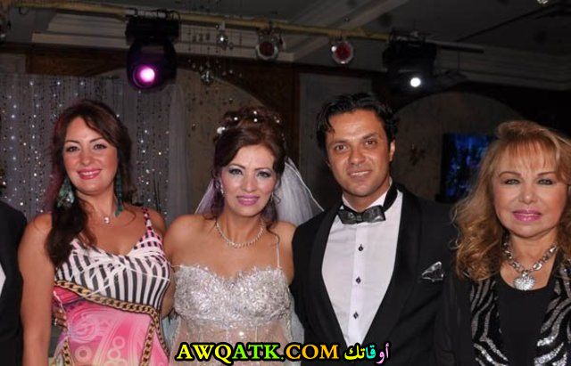 صورة الفنانة المصرية مونيا وزوجها 