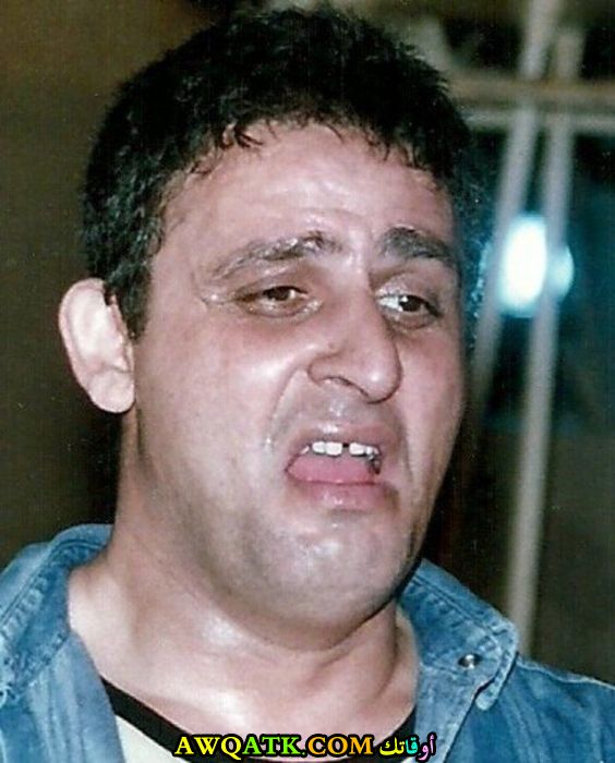 صورة الفنان المصري أشرف طلبة داخل فيلم