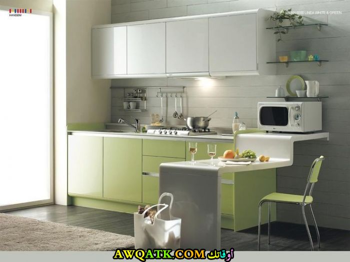 مطبخ الوميتال باللون الأخضر والأبيض في منتهي الجمال